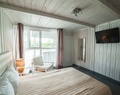 Dom Wiejska 39 A - Pokój w drewnianym domku letniskowym dla 2 osób Numer 1