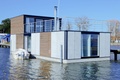 GRAND HT Houseboats - domki na wodzie - DOM NA WODZIE XXL z 2 sypialniami, wanną z hydromasażem, kominkiem, sauną kominkową, fotelem masującym,  tarasem na dachu